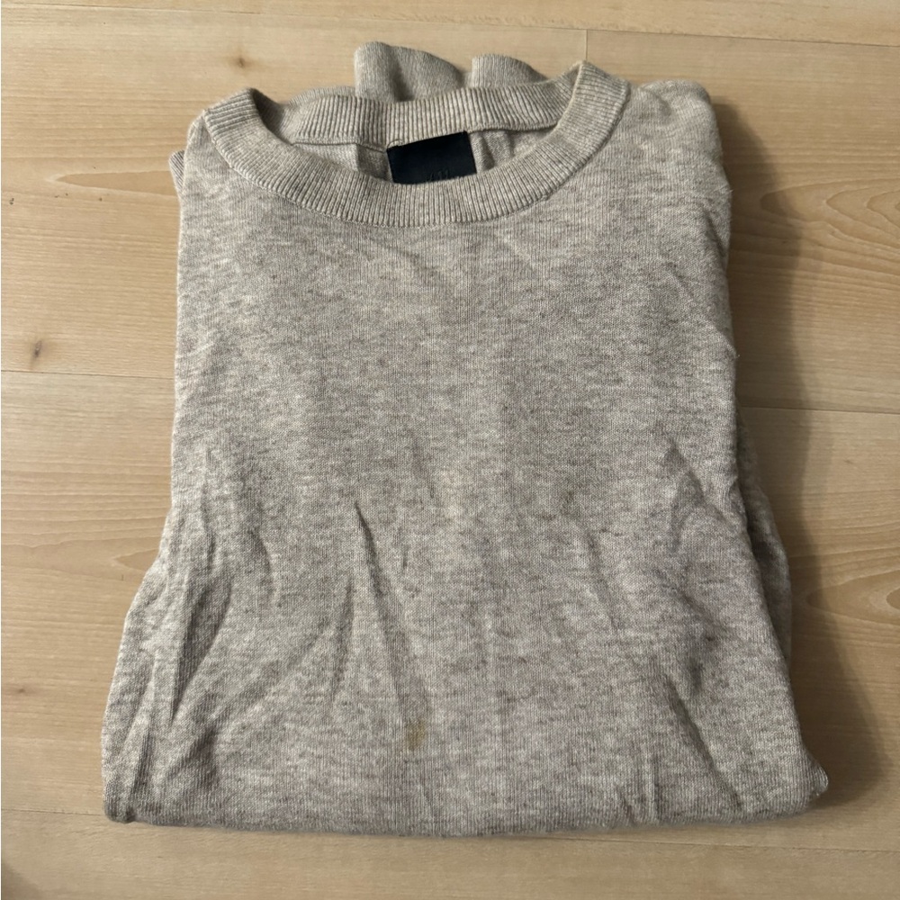 Crew neck sweater.